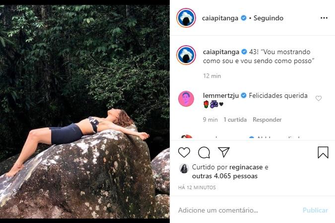 Camila Pitanga aparece tomando sol em grande pedra