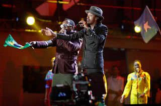 Will.i.am e K'Naan - Getty Images