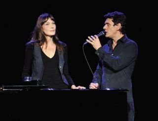 Carla Bruni-Sarkozy e Marc Lavoine - GETTY IMAGES