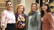 As empresárias Carol Civita, Bete Arbaitman e Denise Antão conferem linha natalina da grife de Tania Bulhões, em São Paulo.