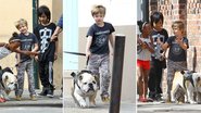 Maddox, Zahara e Shiloh, filhos do casal Brad Pitt e Angelina Jolie, se divertem ao passear com o cão da família - Grosby Group