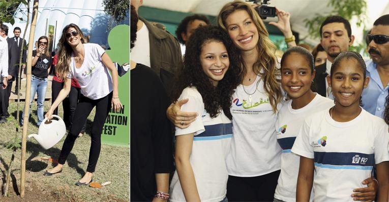 Com uma camiseta larguinha, a modelo, que estaria esperando o segundo filho, planta uma muda de sapucaia em evento comemorativo do Dia do Meio Ambiente. - Gianne Carvalho