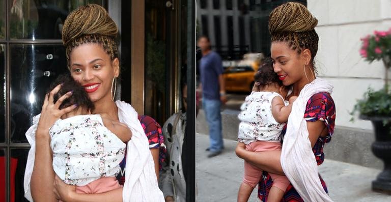 Com Blue Ivy nos braços, Beyoncé desfila novo visual - Grosby Group