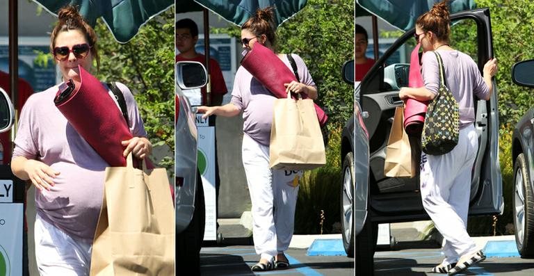 Grávida de oito meses, Drew Barrymore foi fotografada saindo de sua aula de yoga, em Los Angeles - Grosby Group