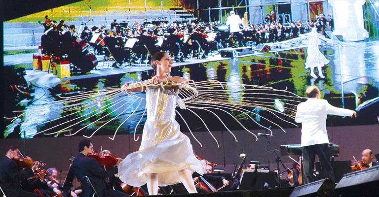 Bailarina faz coreografia para música de Villa- Lobos tocada pela OSB nos 40 anos do Projeto
Aquarius. - André Muzell/AgNews