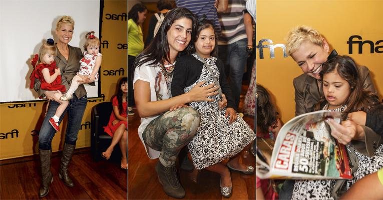 Com Ana Scapin e Ana Barbieri, Xuxa na festa do anuário Happy Down. Ivy,caçula de Romário, e a mãe, Isabella. A estrela lê CARAS. - Gianne Carvalho