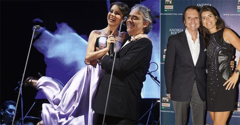 Bocelli levanta Sandy nos braços ao fim das duas canções que eles interpretam em SP. Os recém-casados Emerson e Rossana os aplaudem. - -