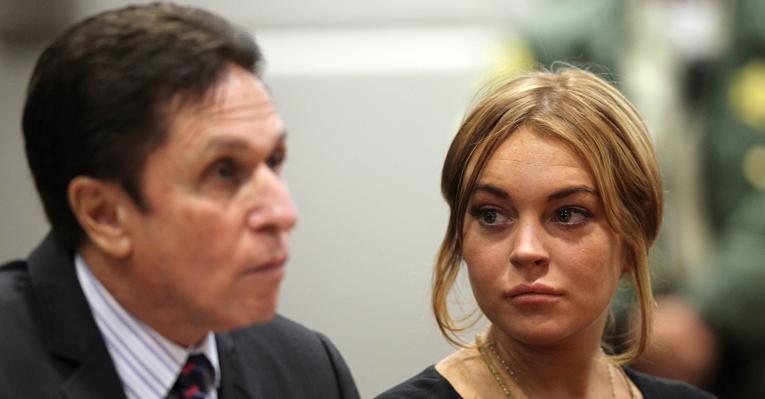 Lindsay Lohan e o advogado Mark Heller - Getty Images