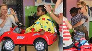 Filho de Charlize Theron corta cabelo em cima de carrinho - The Grosby Group