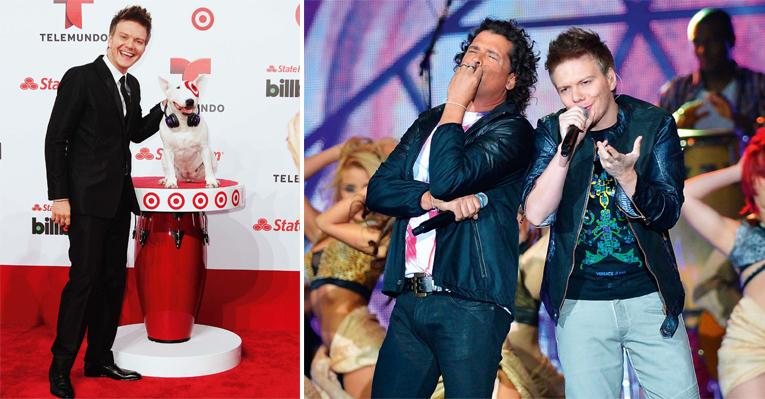 Michel diverte-se no tapete vermelho do Billboard Latin Music Awards, realizado no BankUnited Center, em
Miami. Na festa, o cantor se apresenta com o amigo colombiano Carlos Vives. - Getty Images