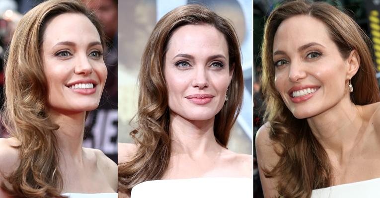 A atriz Angelina Jolie valoriza o cabelo liso com o penteado lateral, que é um sucesso entre as celebridades! - Foto-montagem/ Getty Images