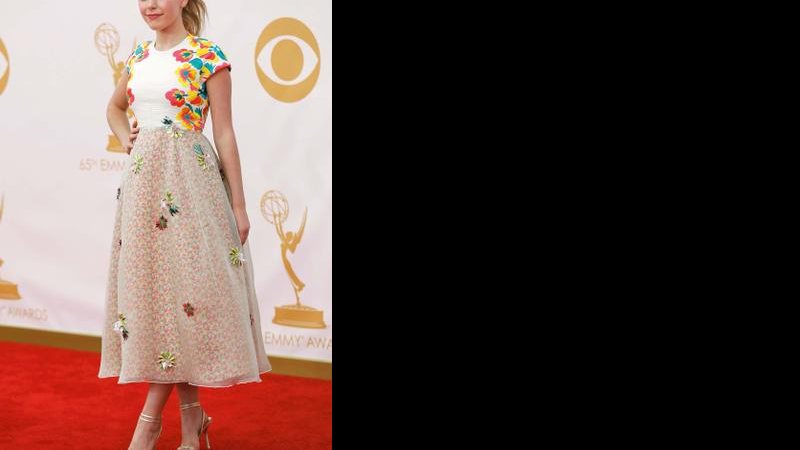 Kiernan Shipka, de Delpozo - Michael Buckner/Getty Images E Reuters / Mario Anzuoni E