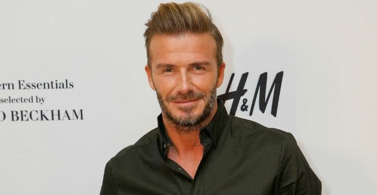 David Beckham posa ao lado dos filhos - Getty Images