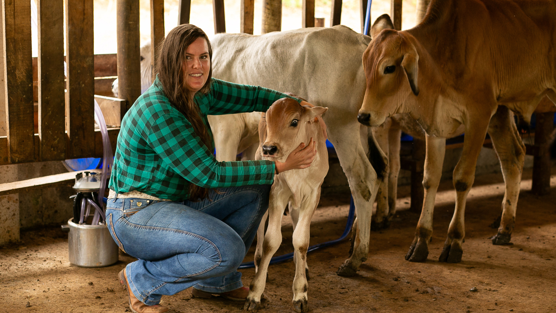 Géssica com animais do campo