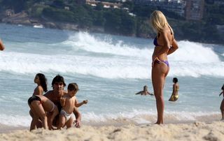 Giba curte Ipanema com a família