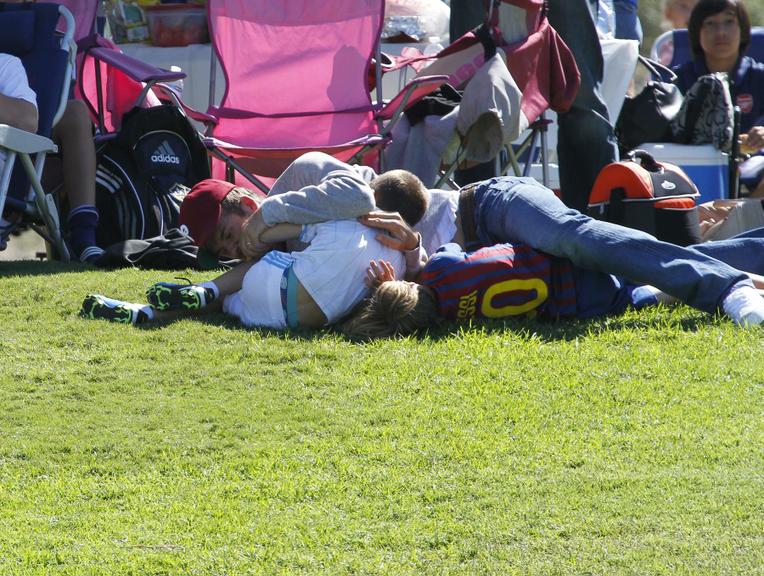 David Beckham com os filhos Romeo e Cruz