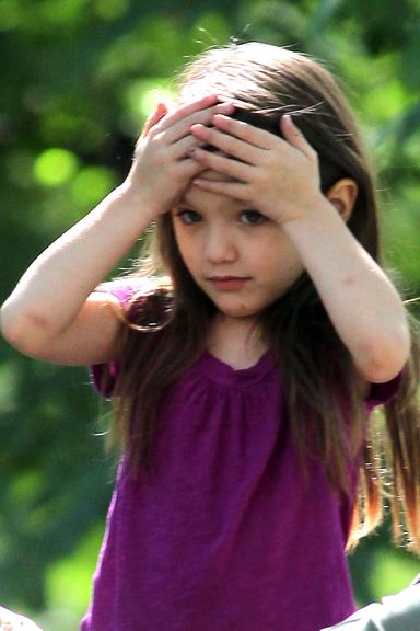 Suri Cruise e suas caretas para os paparazzi