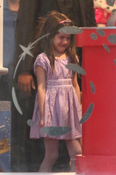 Suri Cruise e suas caretas para os paparazzi