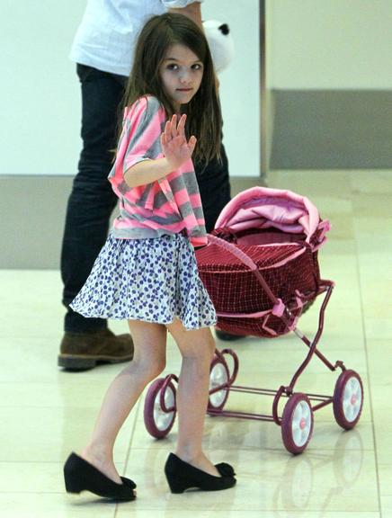 Suri Cruise e suas caretas para os paparazzi