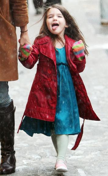 Suri Cruise e suas caretas para os paparazzi