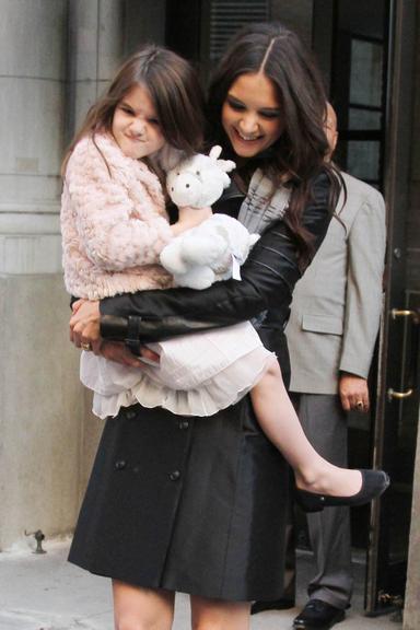 Suri Cruise e suas caretas para os paparazzi