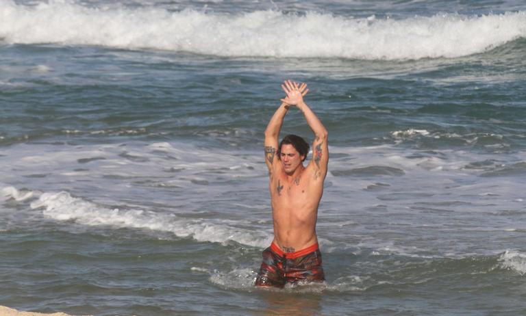 Rômulo Arantes Neto na praia