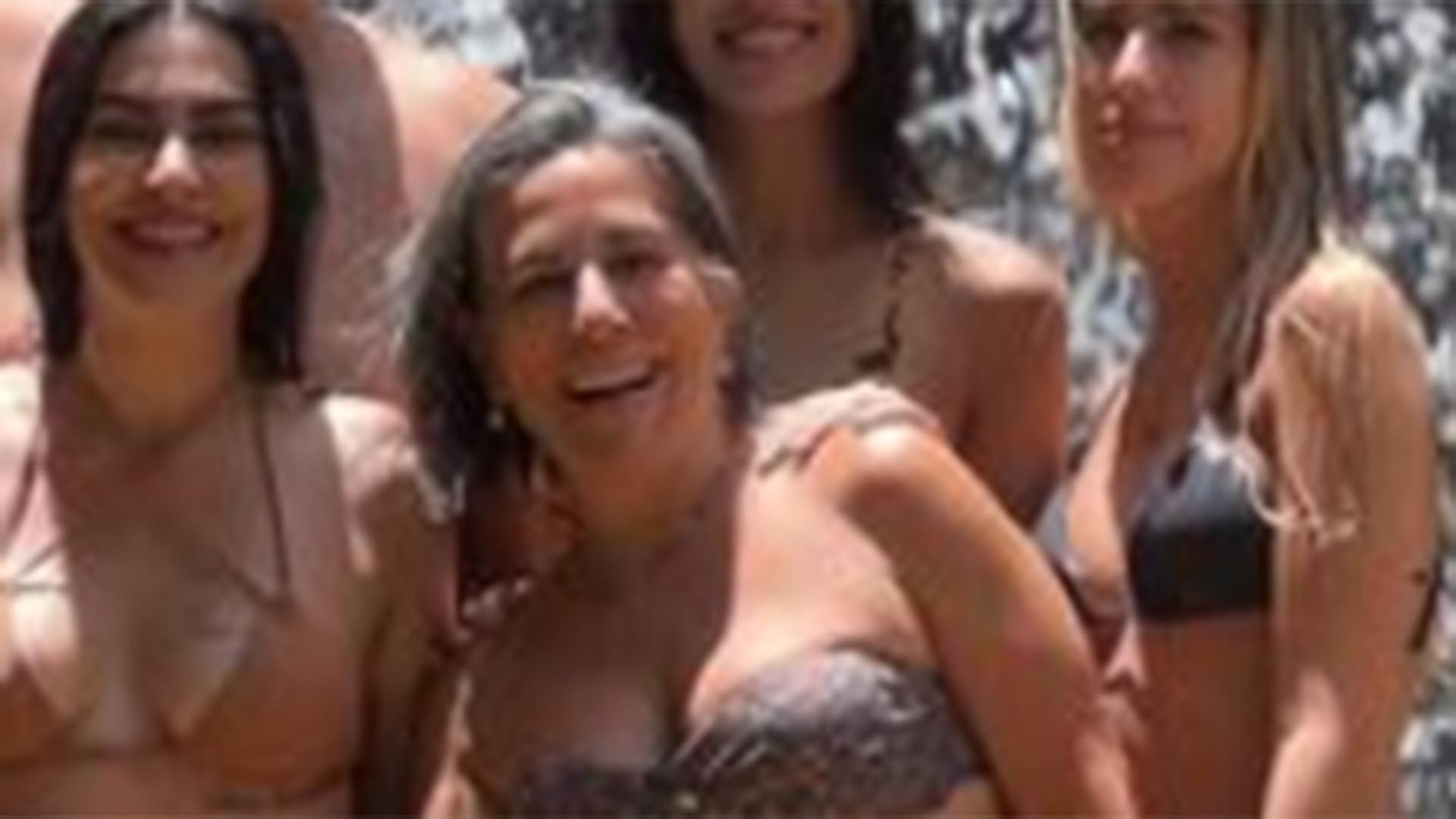 De biquíni, Gloria Pires exibe boa forma em banho de cachoeira com a família