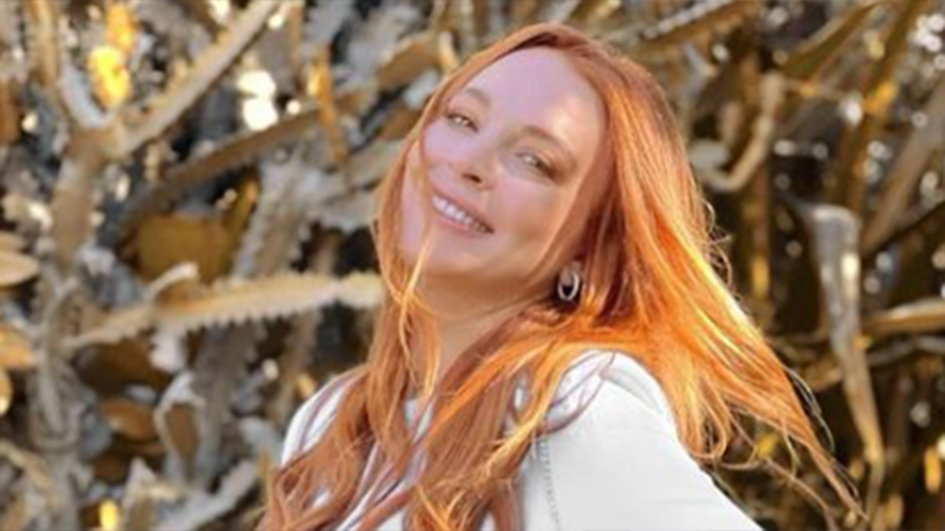 Lindsay Lohan exibe a primeira foto de sua barriga de grávida