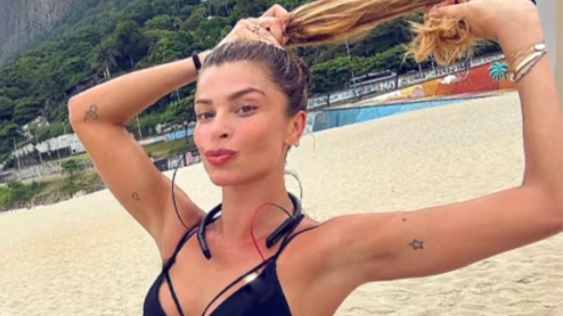Na beira da praia, Grazi Massafera surge treinando com look coladinho: “Teve!”
