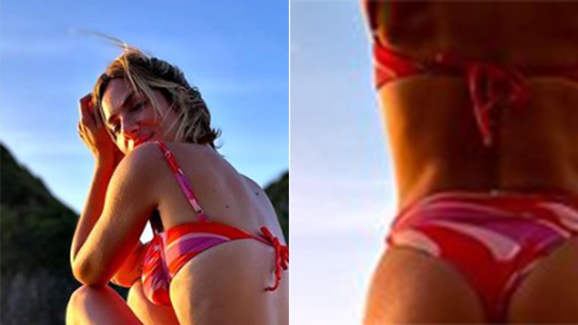De biquíni, Giovanna Ewbank empina o bumbum em Noronha