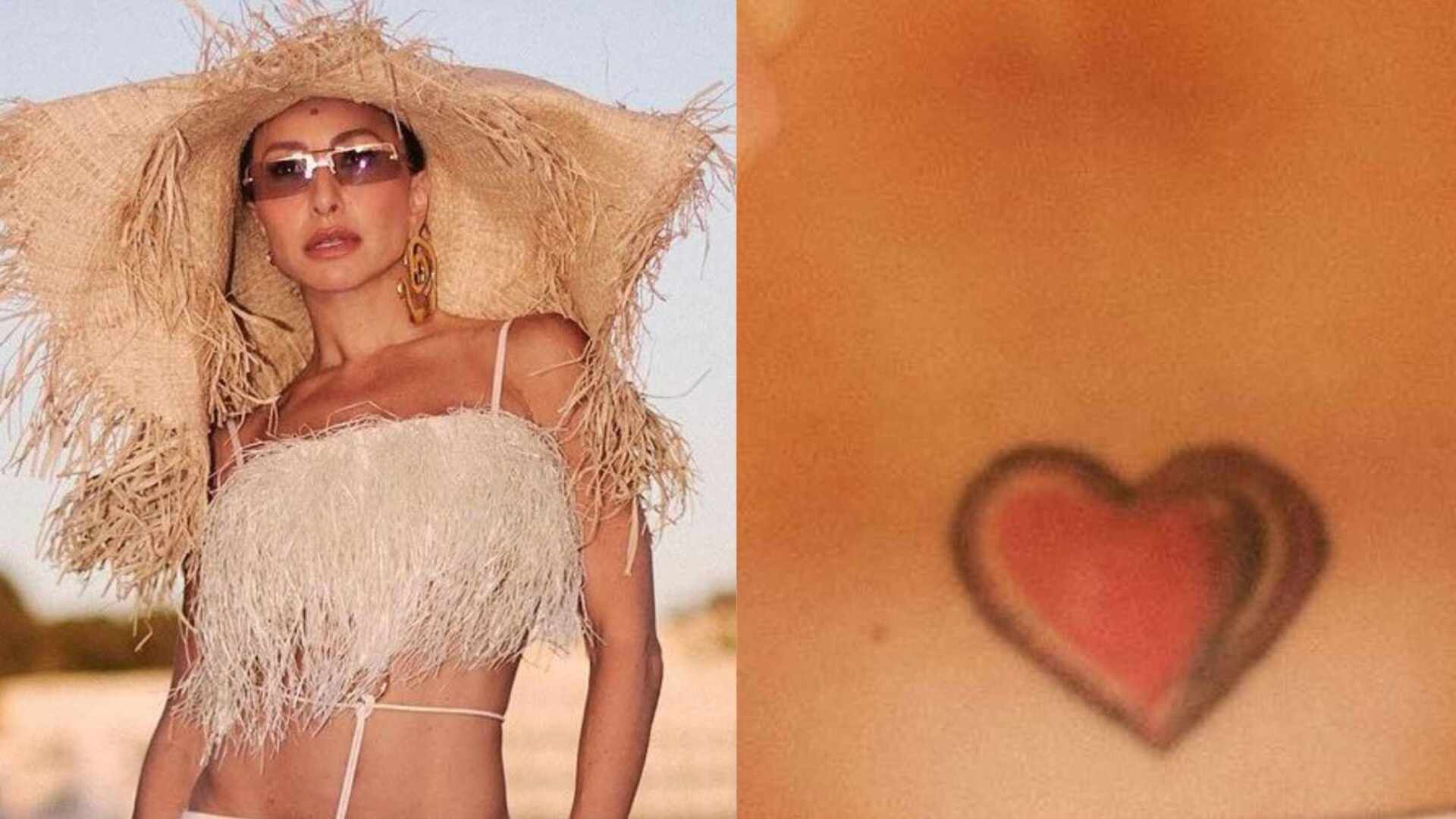 Sem nada por baixo, Sabrina Sato deixa marquinha de sol e tatuagem ‘proibida’ à mostra