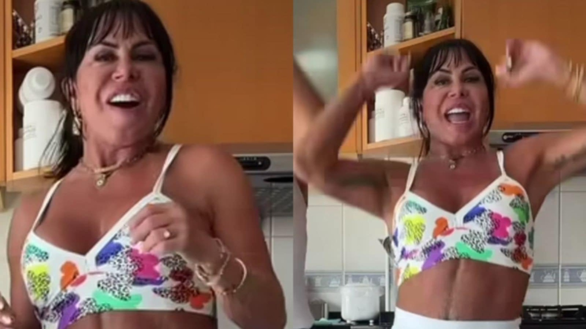 Gretchen exibe barriga desenhada ao dançar de shortinhos com o marido