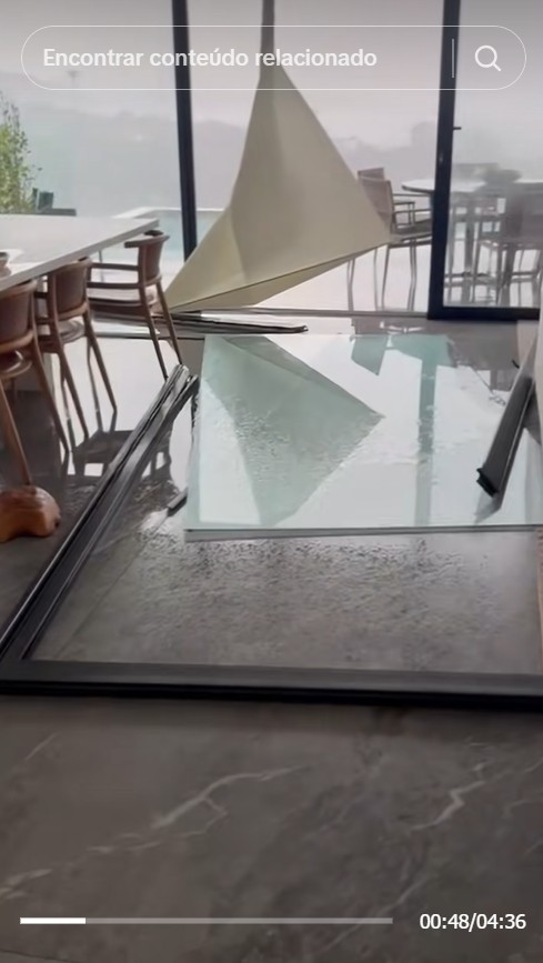 Vidro da casa de Maíra Cardi estoura após ventania - Foto: Reprodução / TikTok @cardinigro