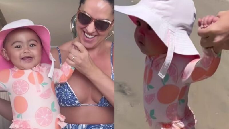 Graciele com a filha na praia