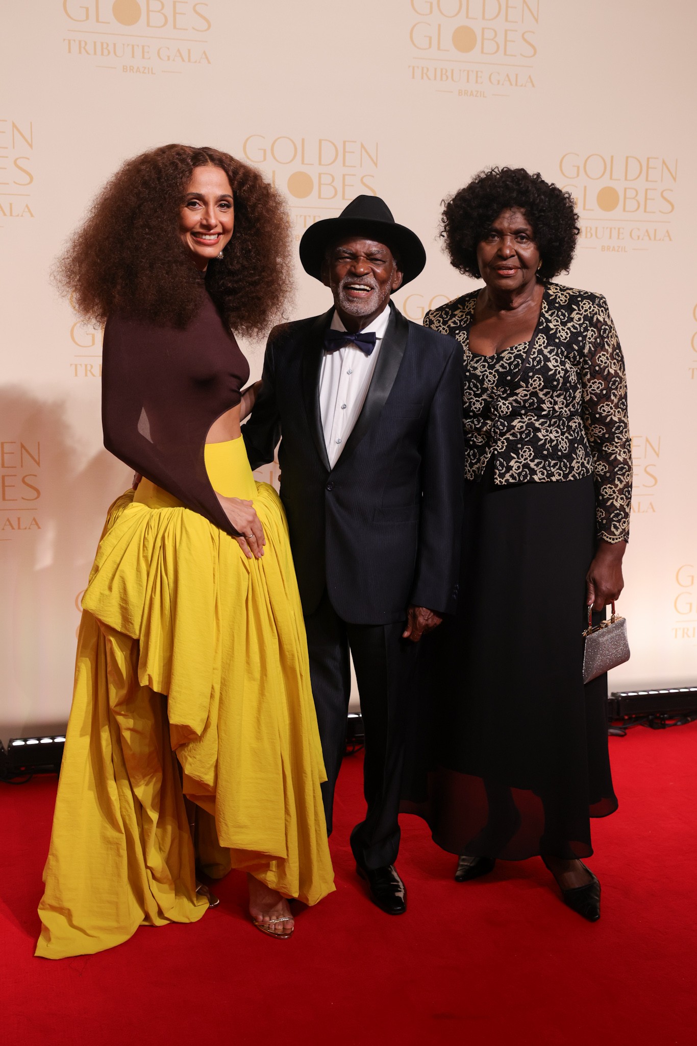 Camila Pitanga com o pai, Antônio Pitanga, e a madrasta, Benedita da Silva - Foto: Lucas Ramos / Brazil News