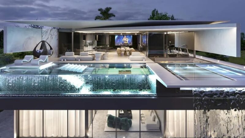 Como é a mansão de Léo Santana? Cantor constrói casa de luxo com piscina transparente em Salvador