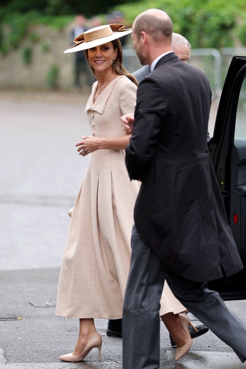 Kate Middleton e o príncipe William no casamento de Peter Phillips Marries e Sperling
