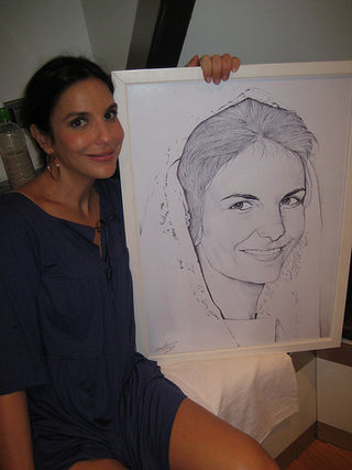 Ivete Sangalo com o retrato de sua mãe, Dona Ivete