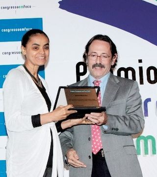 <b>Prêmio no Congresso</b>“><figcaption><b>Prêmio no Congresso</b> / foto: ANDRÉ VICENTE, DENISE USHISIMA, EDGAR MARRA, MARCOS HEIDORN, MURILO MEDINA – GETTY IMAGES E PAULO NEGREIROS</figcaption></figure>
<figure><img loading=