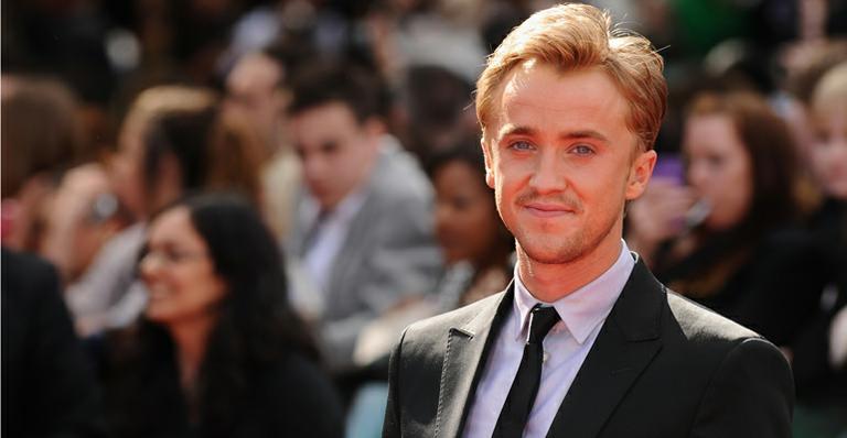 Tom Felton janta com a namorada no Rio