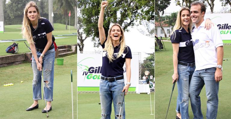 Deborah Secco joga golfe com Roger