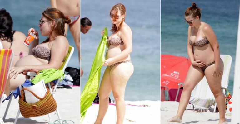 Grávida, Carolinie Figueiredo curte praia
