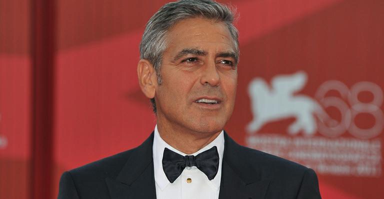 Clooney e Crawford em festival de Veneza