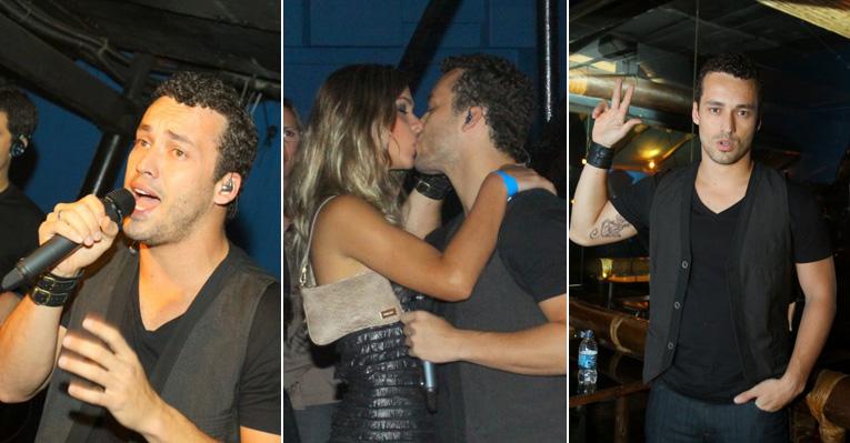 Rodrigo canta, beija e exibe tatuagem