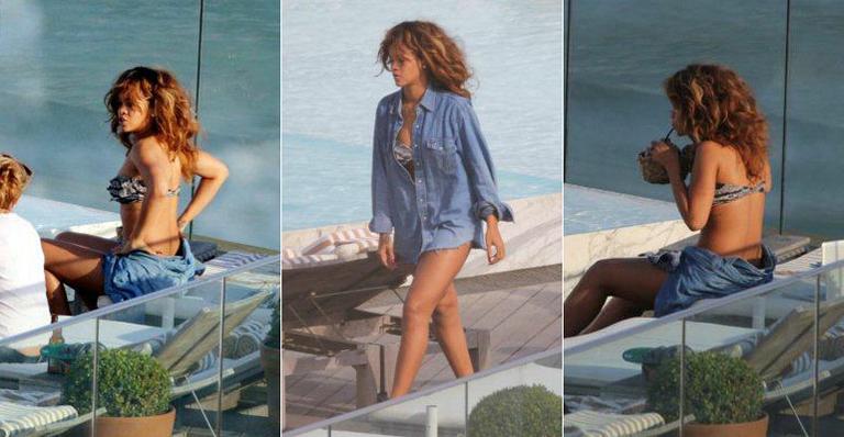 No Brasil, Rihanna curte sol em piscina