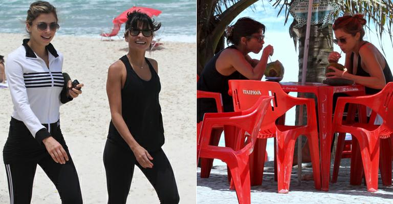 Futura mamãe Grazi Massafera se exercita na praia com Aninha Lima