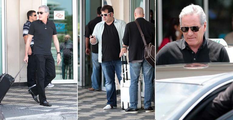 Roberto Justus e Leandro Hassum circulam por aeroporto da capital paulista