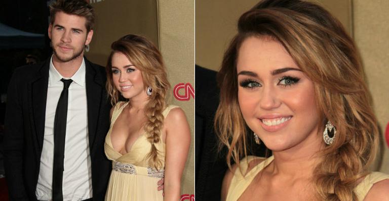 Crescida e muito bem acompanhada, Miley Cyrus vai com decote sexy a red carpet