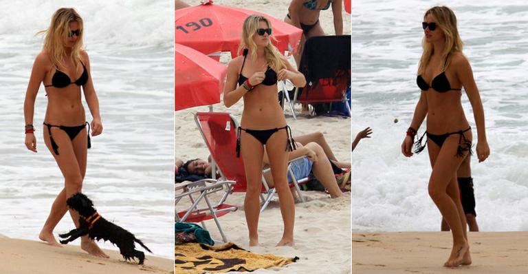 Fiorella Mattheis exibe boa forma na praia do Leblon