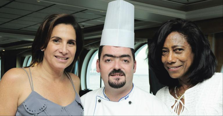 Totia Meirelles e Glória Maria se encontram em evento gastronômico